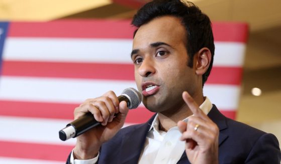 Vivek Ramaswamy speaks at his caucus night event in Des Moines, Iowa, on Monday. Later that night, he announced he was suspending his presidential campaign.