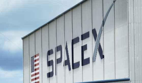 The SpaceX logo is displayed on a building at the Kennedy Space Center in Cape Canaveral, Florida, on May 26, 2020.