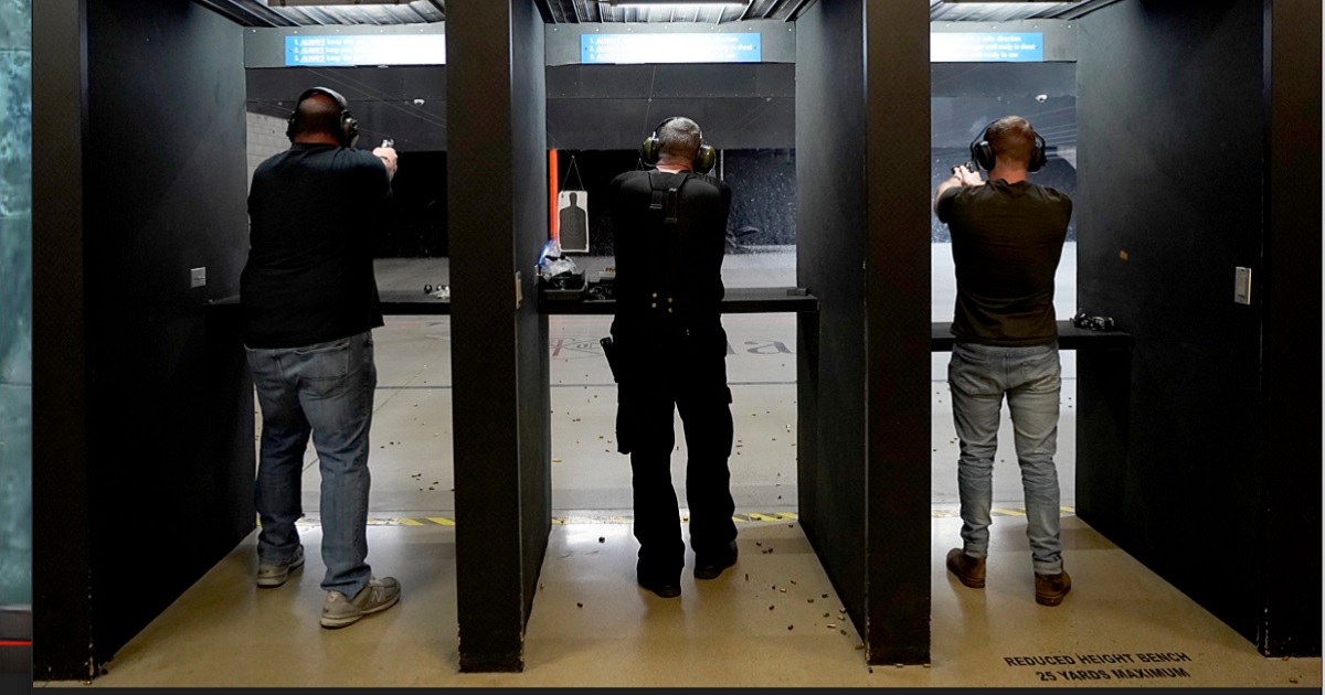 Gun users fire weapons at a Roseville, California, shooting range in a 2022 file photo.