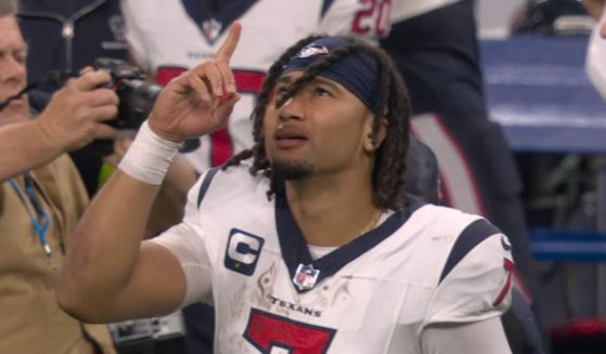 Houston Texans quarterback C.J. Stroud points toward heaven after Saturday's victory over the Indianpolis Colts.
