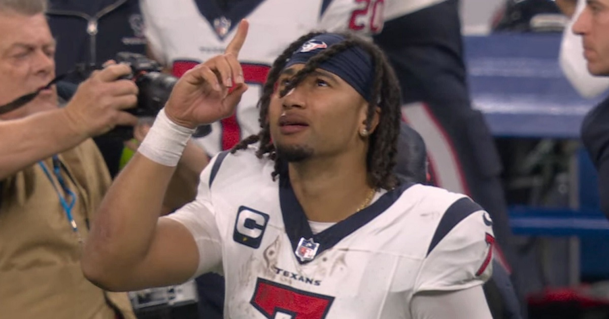 Houston Texans quarterback C.J. Stroud points toward heaven after Saturday's victory over the Indianpolis Colts.