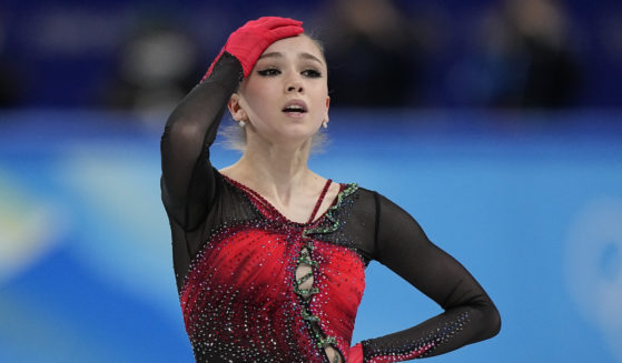 Kamila Valieva of the Russian Olympic Committee reacts during the women's team free skate program at the 2022 Winter Olympics on Feb. 7, 2022, in Beijing.