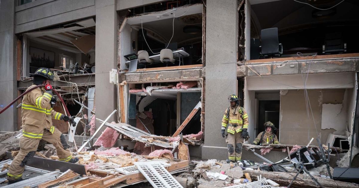 Firefighters in Fort Worth, Texas, work the scene of an explosion at the Sandman Signature Hotel downtown on Monday.