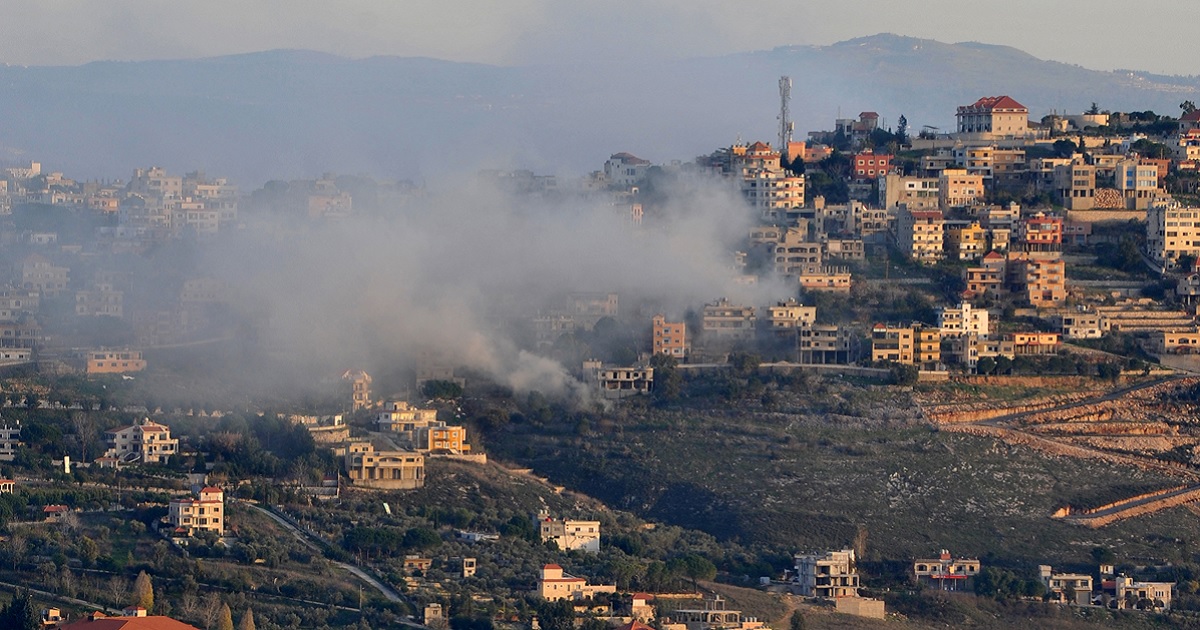 Smoke rises over buildings on the outskirts of the southern Lebanese border village of Khiam following a reported Israeli bombardment on January 7, 2024, amid ongoing battles between Israel and Palestinian Hamas militants in the Gaza Strip.