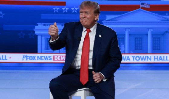 Former President Donald Trump gives the crowd a thumbs-up on Wednesday at a town hall event in Des Moines, Iowa, aired by Fox News.