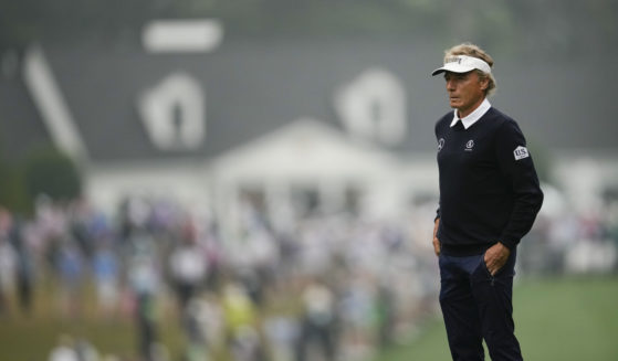 Bernhard Langer, of Germany, waits to hit on the first hole during the second round of the Masters golf tournament at Augusta National Golf Club on April 7, 2023, in Augusta, Georgia.