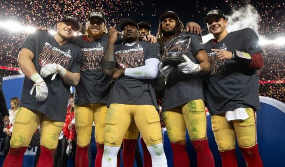 From left, Christian McCaffrey, George Kittle, Deebo Samuel, Trent Williams, Fred Warner and Brock Purdy of the San Francisco 49ers celebrate their victory over the Detroit Lions in the NFC championship game at Levi's Stadium in Santa Clara, California, on Jan. 28.