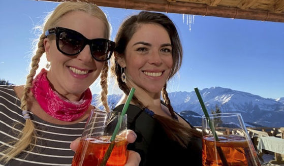 This undated image shows Ana Maria Knezevic, right, and her friend Sanna Rameau. Police are searching for Knezevic, a 40-year-old Colombian-American woman who went missing in Madrid.