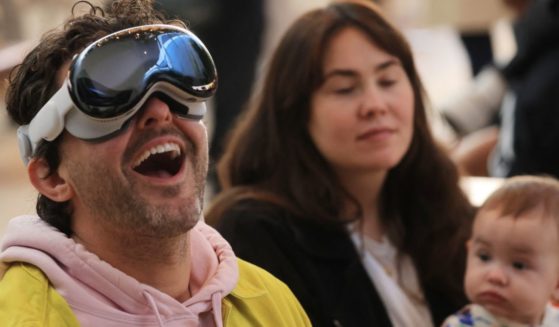 A customer tries the Apple Vision Pro during the product's launch at Apple The Grove in Los Angeles on Friday.