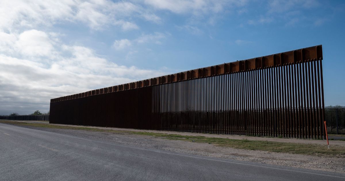 A segment of the new border wall is seen in front of the older border wall in Del Rio, Texas on March 5, 2023.