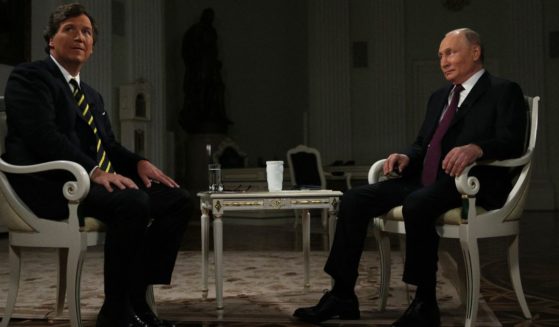 Tucker Carlson, left, interviews Russian President Vladimir Putin in Moscow, Russia, on Feb. 6.