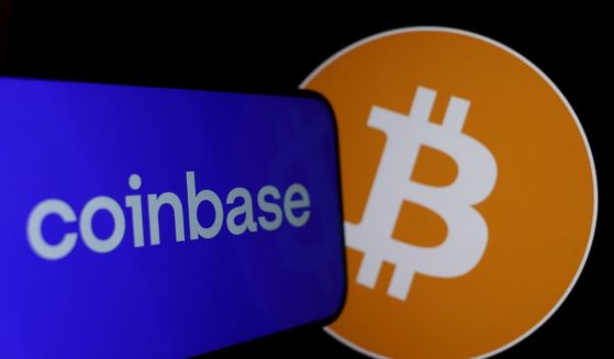 Some news outlets said a heavy surge in Bitcoin trading may have caused the problems on Coinbase's site.