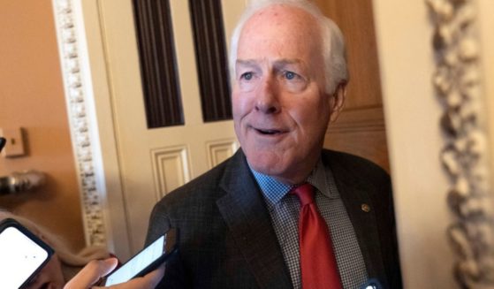 Sen. John Cornyn, R-Texas, speaks to reporters Wednesday after Senate Minority Leader Mitch McConnell, of Kentucky, announced he will step down as Senate Republican leader in November.