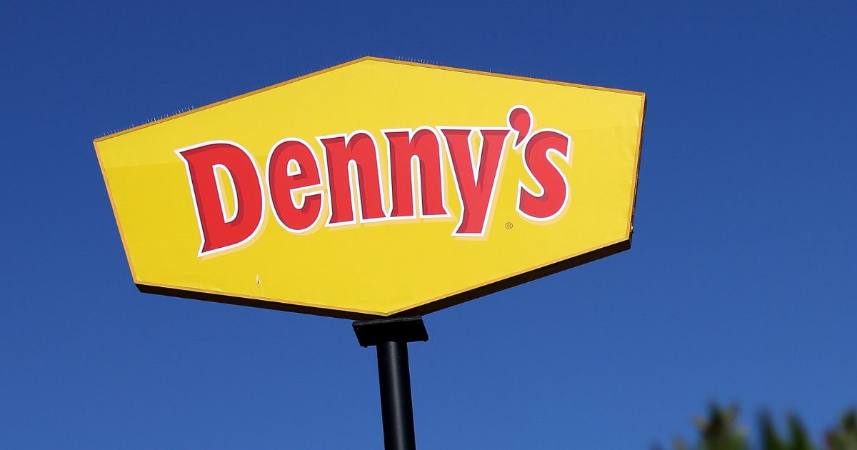 A Denny's sign is pictured outside of a restaurant in Emeryville, California, on Feb. 13, 2023.