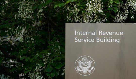 A sign for the Internal Revenue Service building in Washington, D.C., is shown.