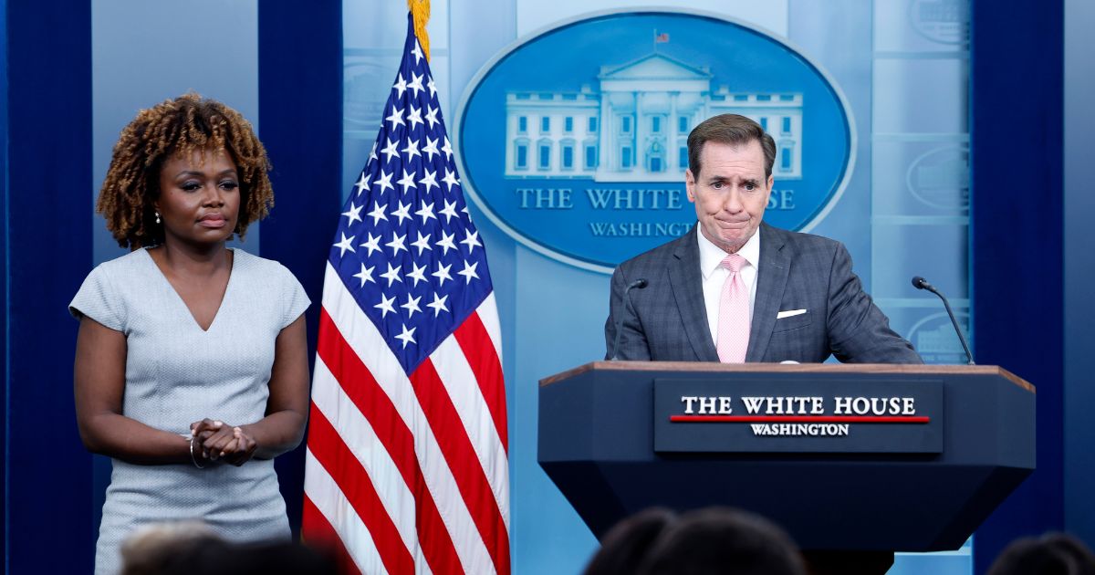 White House press secretary Karine Jean-Pierre, left, looks on while John Kirby, White House national security communications adviser, speak during a daily news briefing at the James S. Brady Press Briefing Room of the White House in Washington on Tuesday.
