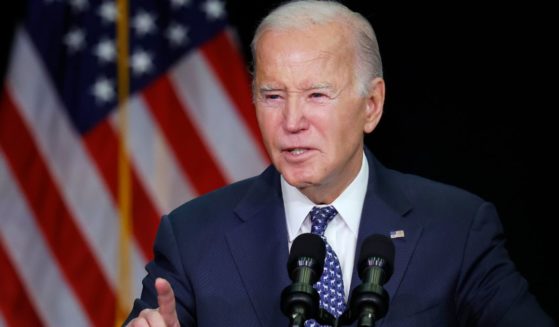President Joe Biden speaks during the House Democrats' annual issues conference in Leesburg, Virginia, on Thursday.