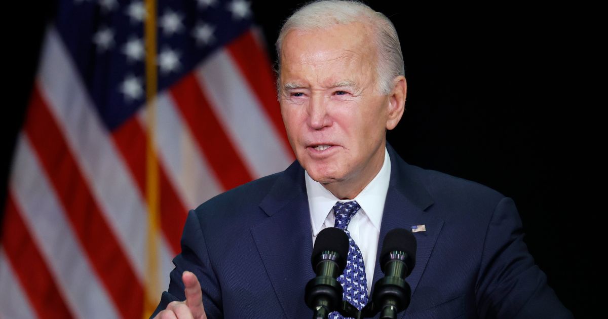 President Joe Biden speaks during the House Democrats' annual issues conference in Leesburg, Virginia, on Thursday.