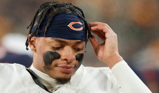 Justin Fields of the Chicago Bears reacts on the sideline in the second half against the Green Bay Packers at Lambeau Field on Jan. 7 in Green Bay, Wisconsin.