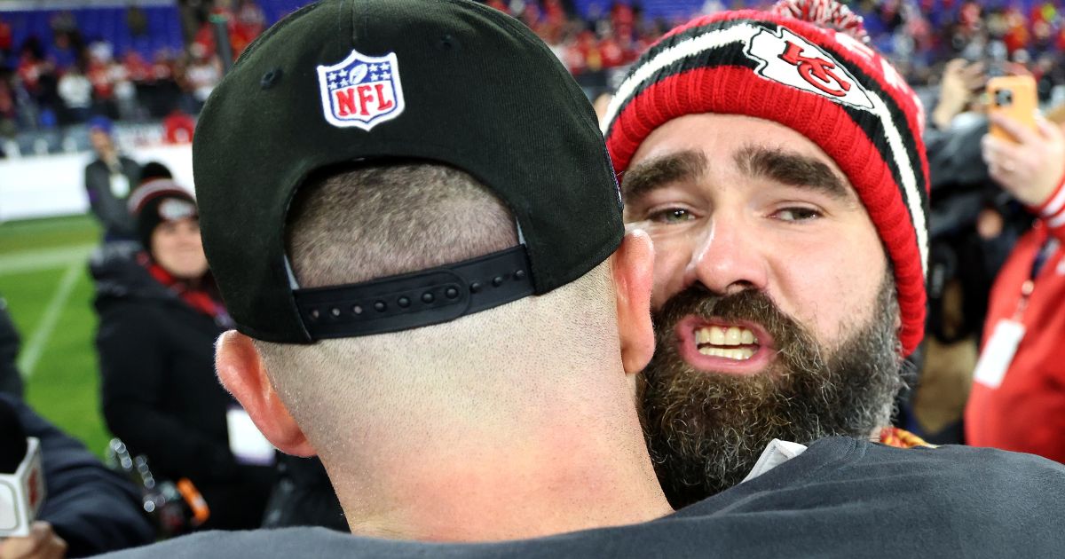 Jason Kelce, right, hugs brother Travis Kelce after the Kansas City Chiefs defeated the Baltimore Ravens in the AFC Championship Game in Baltimore, Maryland, on Jan. 28.