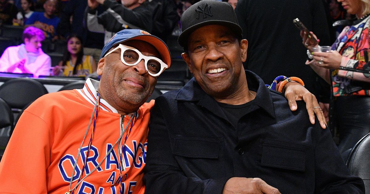 Director Spike Lee and actor Denzel Washington at a basketball game between the Los Angeles Lakers and New York Knicks in 2023.