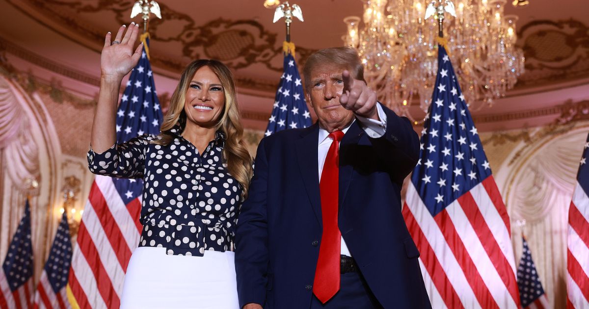 Former first lady Melania Trump, left, and Former President Donald Trump, right, stand together during an event at his Mar-a-Lago home in Palm Beach, Florida, on Nov. 15, 2022.