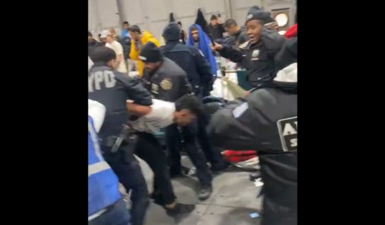 NYPD officers are attacked by immigrants at the city's Randall's Island shelter.