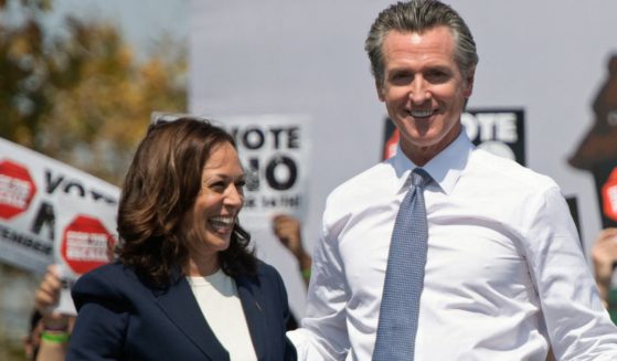 Vice President Kamala Harris, left, and California Gov. Gavin Newsom, right, attend a campaign event against his recall election in San Leandro, California, on Sept. 8, 2021.