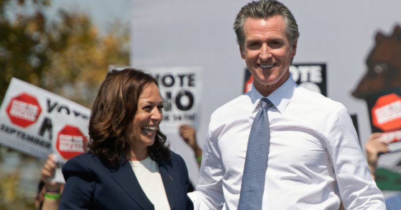 Vice President Kamala Harris, left, and California Gov. Gavin Newsom, right, attend a campaign event against his recall election in San Leandro, California, on Sept. 8, 2021.