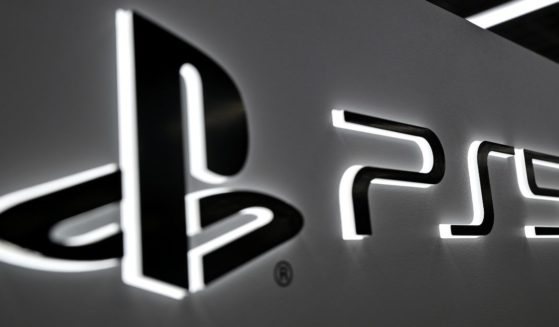 The logo for Sony's PlayStation 5 displayed in an electronics store in Tokyo, Japan.