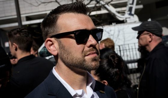 Jack Posobiec arrives to gather with supporters of former President Donald Trump outside the New York courthouse where Trump was arraigned on April 4.