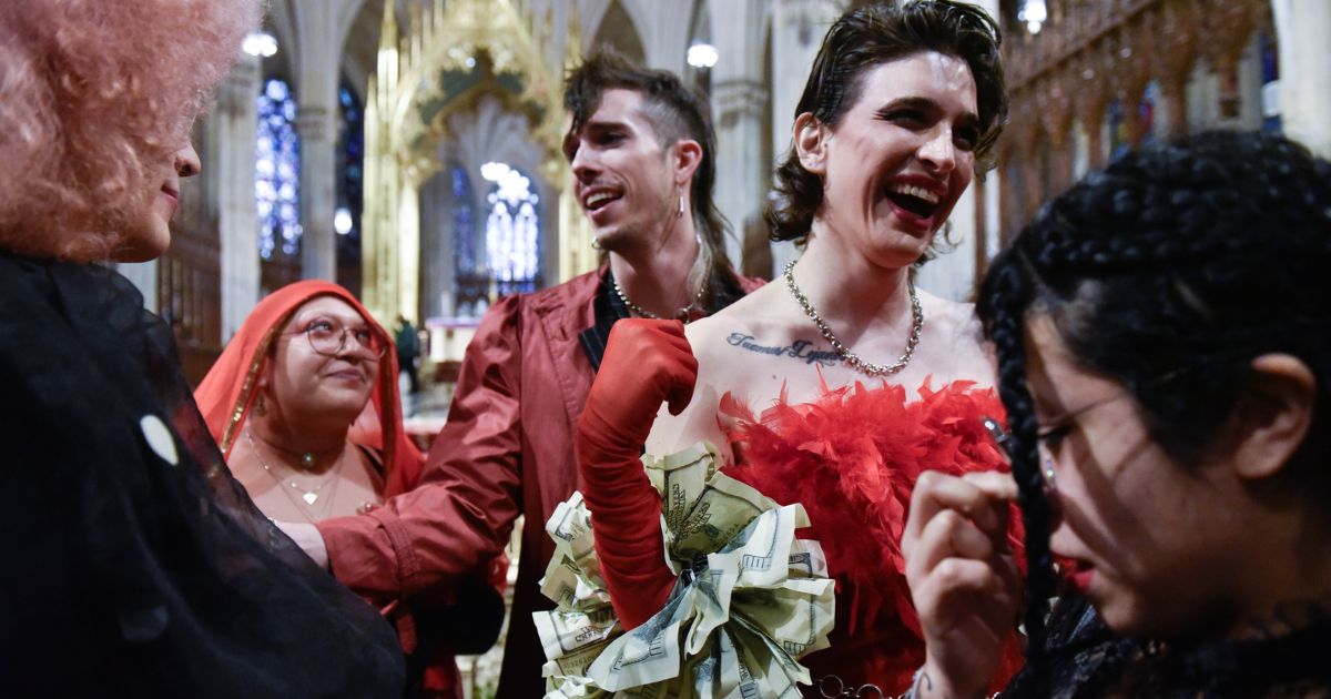 People attend the funeral of transgender atheist Cecilia Gentili at St. Patrick's Cathedral in New York City on Feb 15.