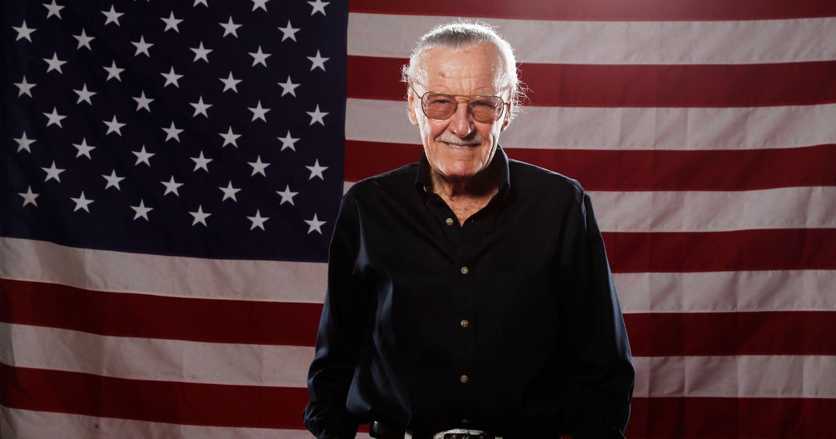 Comic book icon Stan Lee in front of an American flag at the LMT Music Lodge in San Diego in 2011.
