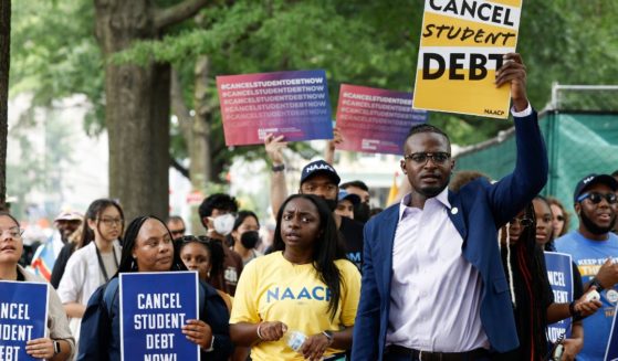 People for student debt relief demonstrate in front of the White House after the U.S. Supreme Court struck down President Biden's student debt relief program on June 30, 2023 in Washington, D.C.