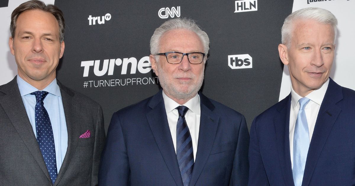 CNN stars Jake Tapper, left, Wolf Blitzer and Anderson Cooper, seen at a 2016 event, may have salary cuts -- or even job changes -- in their future.