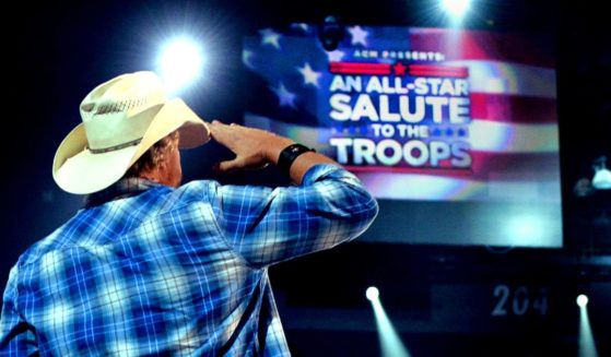 Toby Keith saluting the troops at ACM Presents: An All-Star Salute To The Troops at the MGM Garden Arena in 2014.