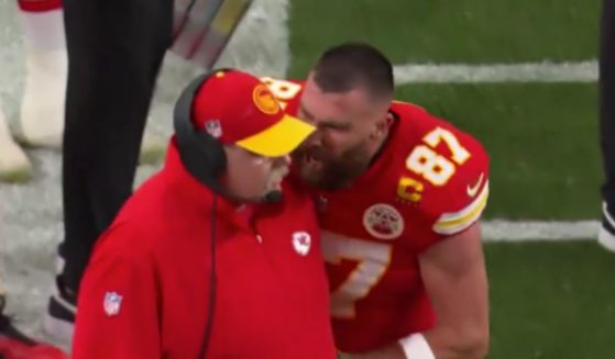 Kansas City Chiefs tight end Travis Kelce, right, yells and shoves head coach Andy Reid on the sideline during Super Bowl LVIII in Las Vegas, Nevada, on Sunday.