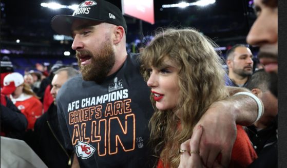 Travis Kelce of the Kansas City Chiefs celebrates with Taylor Swift after a 17-10 victory against the Baltimore Ravens in the AFC Championship Game Jan. 28 in Baltimore, Maryland.