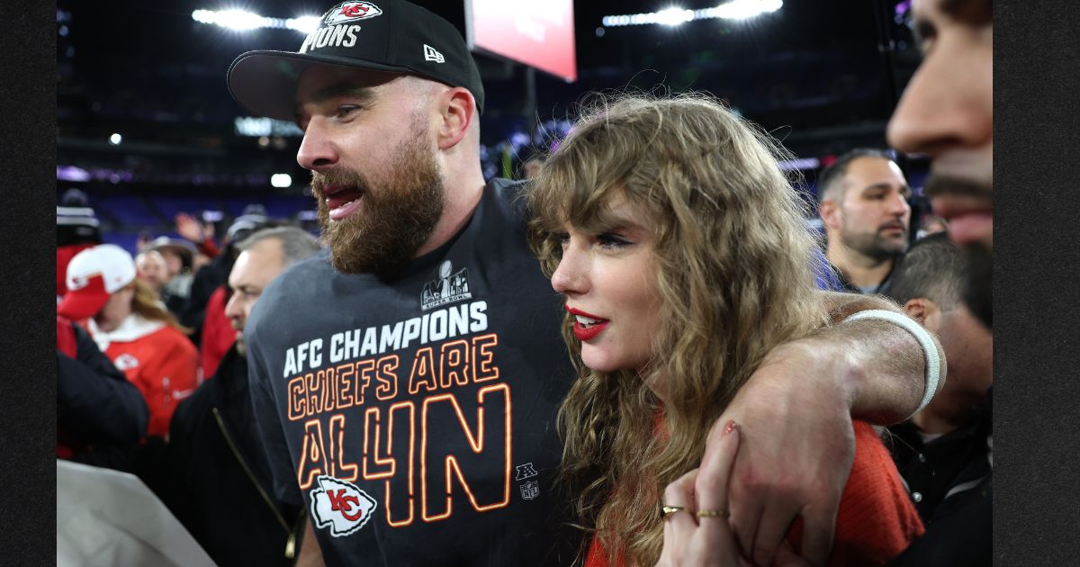 Travis Kelce of the Kansas City Chiefs celebrates with Taylor Swift after a 17-10 victory against the Baltimore Ravens in the AFC Championship Game Jan. 28 in Baltimore, Maryland.