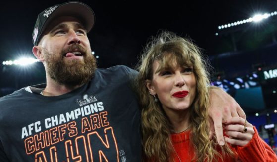 Travis Kelce, of the Kansas City Chiefs, (left) celebrates with Taylor Swift after defeating the Baltimore Ravens in the AFC Championship Game, Jan. 28, in Baltimore, Maryland.