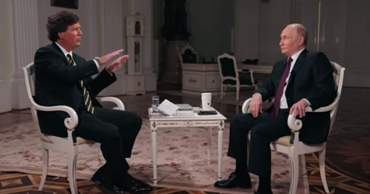 Tucker Carlson interviewing Vladimir Putin