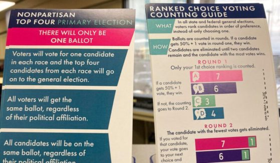 Brochures are displayed at the Alaska Division of Elections office in Anchorage, Alaska, on Jan. 21, 2022, detailing changes to elections.