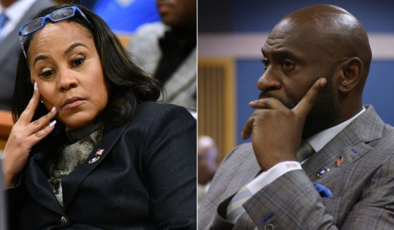On Thursday, special prosecutor Nathan Wade, right, testified at the Fulton County Courthouse in Atlanta, Georgia, that Fulton County District Attorney Fani Willis, left, had reimbursed him for vacations that they had taken together.