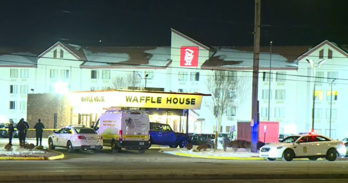 Police are at the scene of a shooting at a Waffle House in Indianapolis.