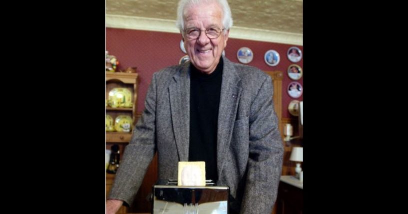 William Post poses with a Pop-Tart in 2003. Post, who played an important role in the development of the Pop-Tarts toaster pastry, died Saturday. He was 96.