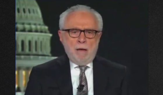 CNN's Wolf Blitzer appeared unwell before his segment was abruptly halted Thursday.