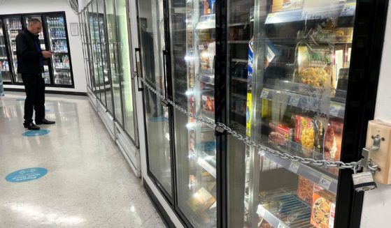 A padlock and chain secure freezer doors in a Walgreens in San Francisco, California, on July 18.