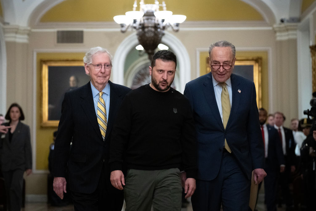 Walking with Senate Minority Leader Mitch McConnell (R-KY), left, and Senate Majority Leader Chuck Schumer (D-NY), right, Ukrainian President Volodymyr Zelenskyy arrives at the U.S. Capitol to meet with Congressional leadership on Dec. 12, in Washington, D.C.