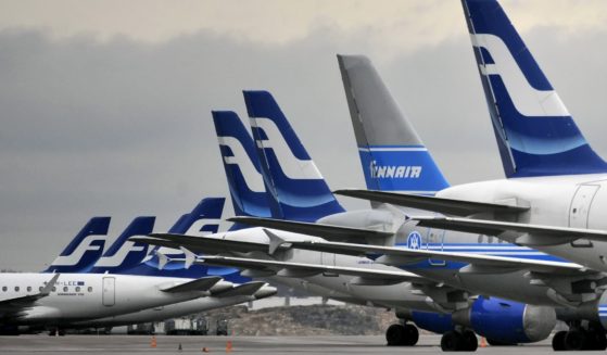 Passenger planes of the Finnish national airline carrier, Finnair, sit on the tarmac at Helsinki Airport in 2009.