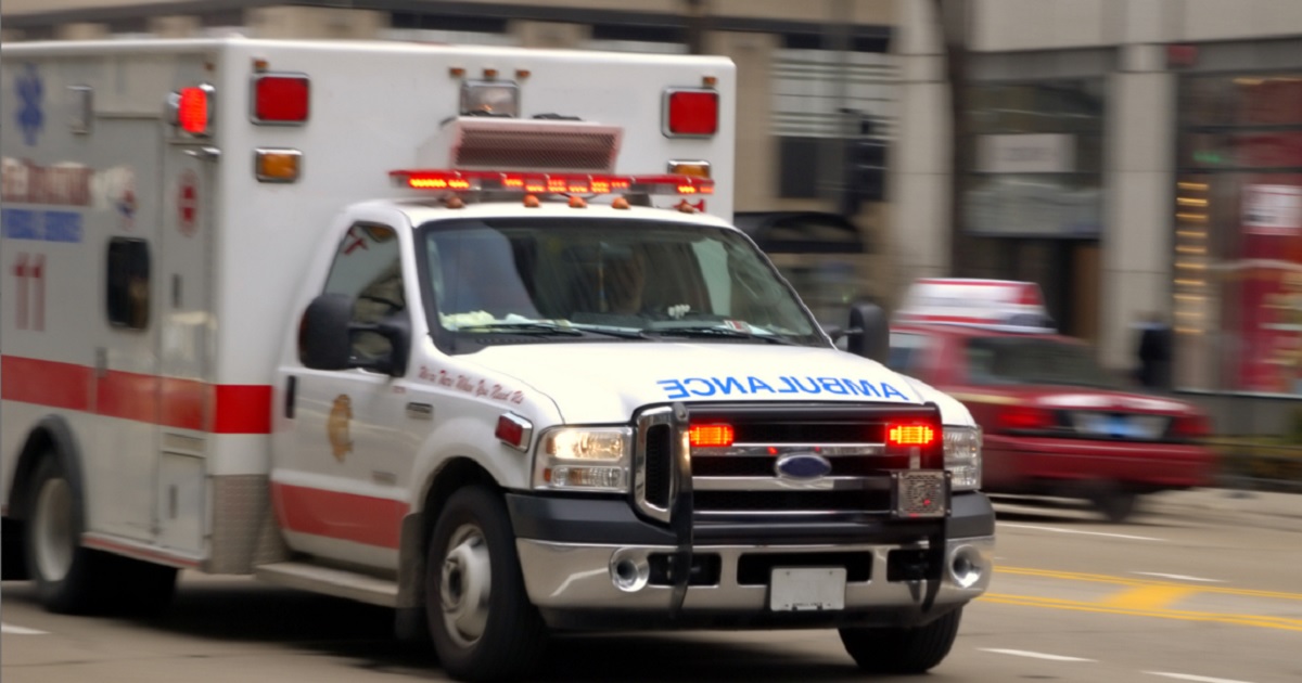 A stock photo of an ambulance responding to a call.